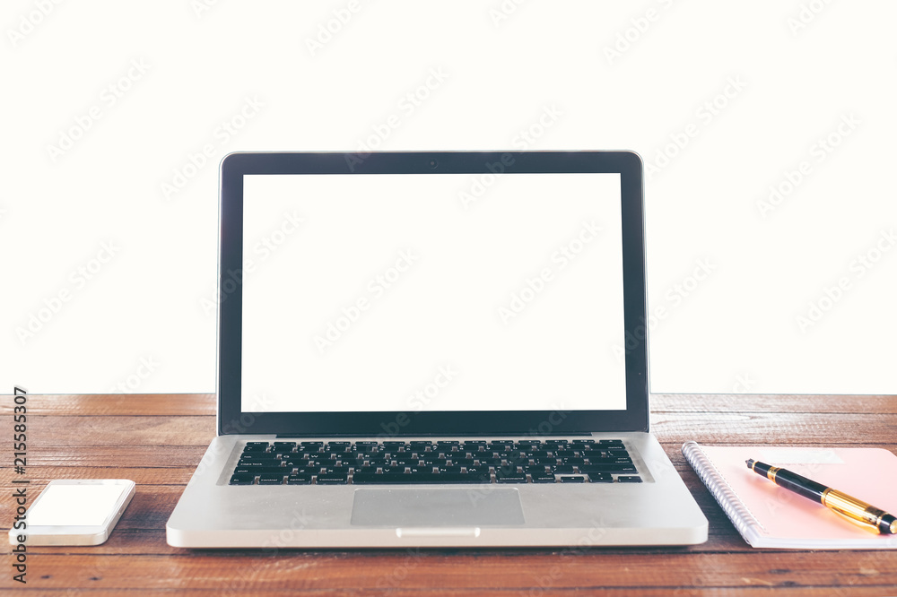 Blank screen Laptop on wood table top isolated on white background