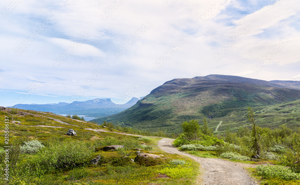 View of mountain nature at Bjorkliden in northern Sweden with famous Lapporten in the background.