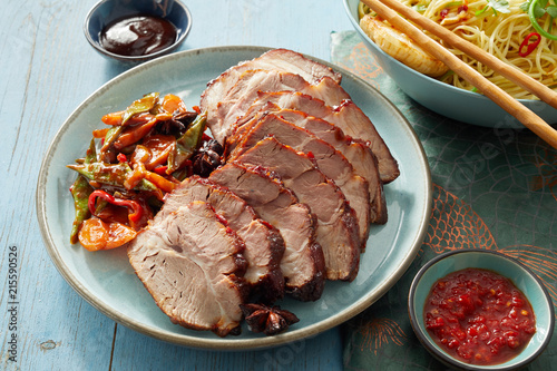 Plate of Roast Pork with Sauces and Noodle Bowl