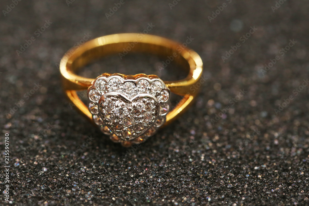 Diamond heart symbol on gold ring Diamond heart symbol on gold ring