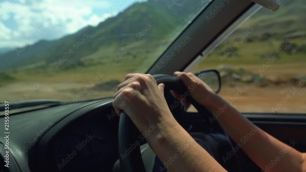 people journey driving vehicle car travel road trips with beautiful sun light in mountains, hand driver control steering wheel. people journey driving vehicle car travel road trips with beautiful sun light in mountains, hand driver control steering wheel.