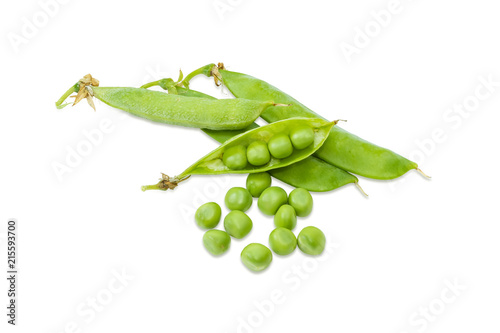 Husked green peas and pea pods on a white background