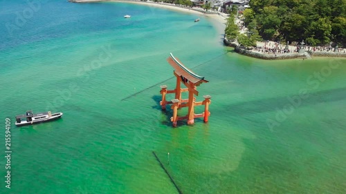 Aerial Drone circling around Itsukushima Shrine at Miyajima, Hiroshima, Japan.