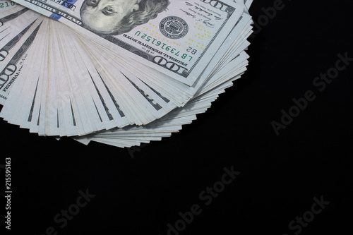 Hand holding American dollar  isolated on white background photo