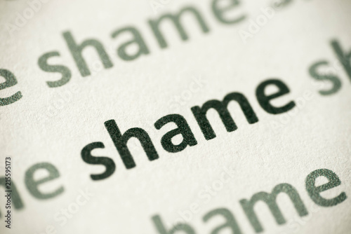Fotografia word shame printed on paper macro