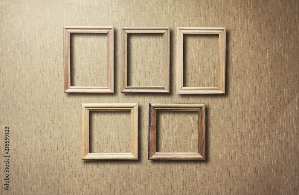 old frames on wooden wall old frames on wooden wall
