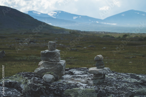 Rock piles in the misty mountain views © Ronja