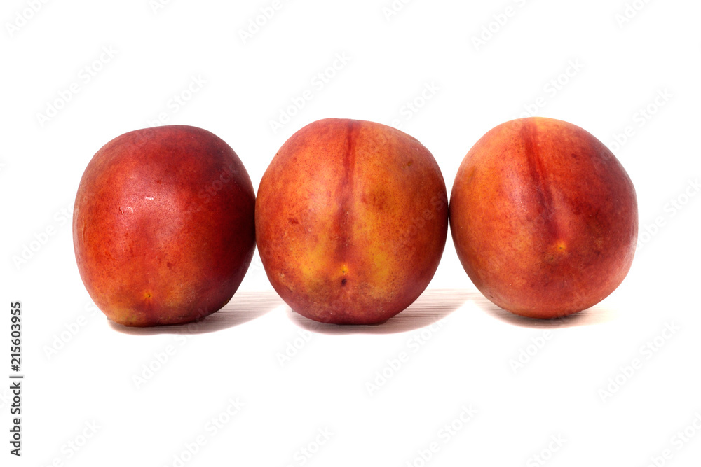 Three nectarines isolated on white background Three nectarines isolated on white background