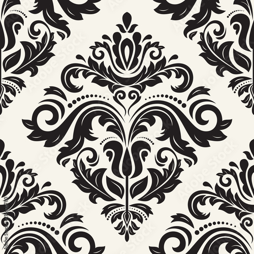 Classic seamless vector pattern. Damask orient light beigeand black ornament. Classic vintage background. Orient ornament for fabric  wallpaper and packaging