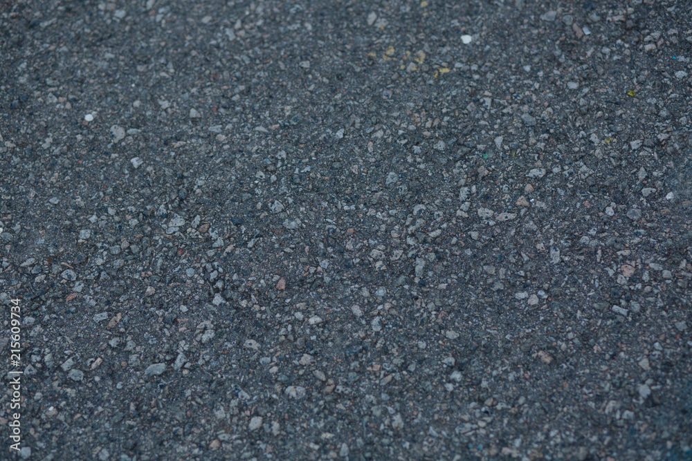 Closeup shot of a dark grey asphalt texture Closeup shot of a dark grey asphalt texture