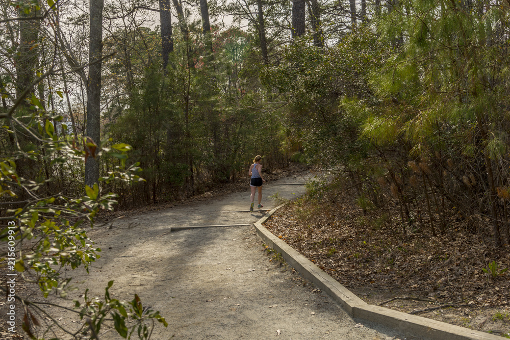Jogging on the Noland trail path in Lake Maury, Virginia
