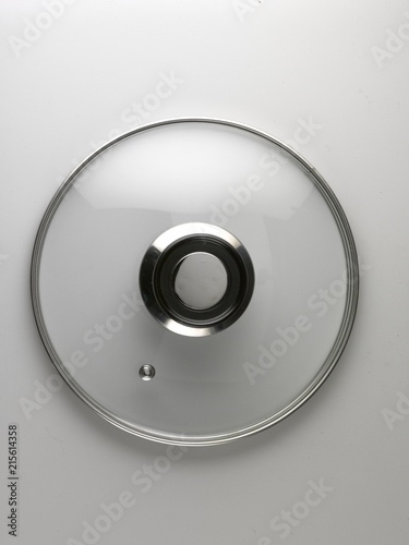 Pot lid isolated on white. Round and in clear glass