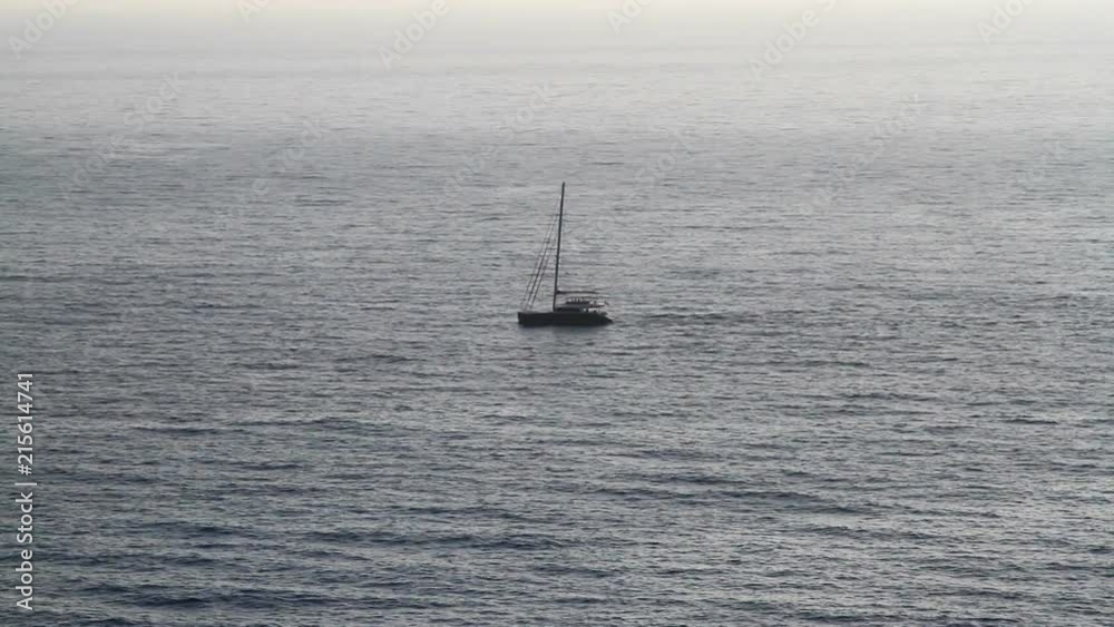 Small Catamaran Ship Sailing at Mediterranean Sea Small Catamaran Ship Sailing at Mediterranean Sea