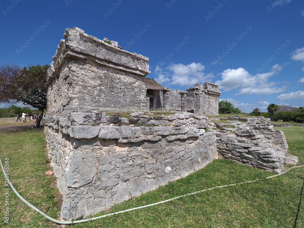 Ancient ruins of stony mayan temple at TULUM city at Mexico on archaeological site Ancient ruins of stony mayan temple at TULUM city at Mexico on archaeological site