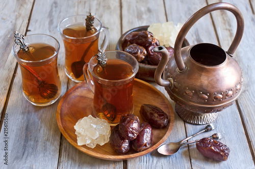 Arabic tea and dates photo