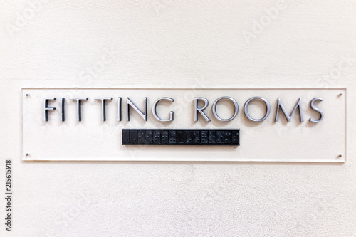Fényképezés Fitting Room sign closeup in mall store shop retail clothing changing door entra