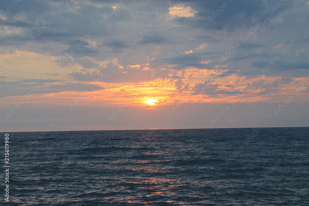 Obraz premium Coucher de soleil à la mer