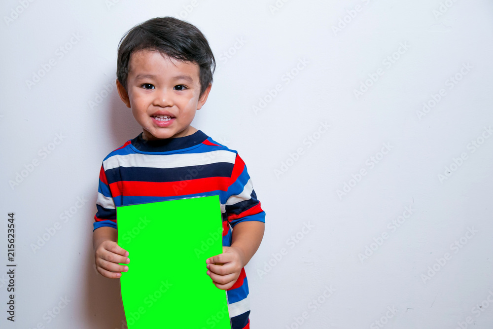 Smiling Face Of Asian Young Boy on white background. Stock Photo Smiling Face Of Asian Young Boy on white background. Stock Photo