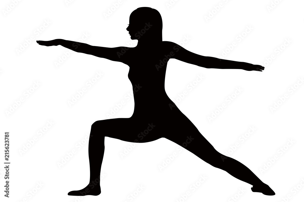 Woman practicing yoga, standing in Virabhadrasana pose