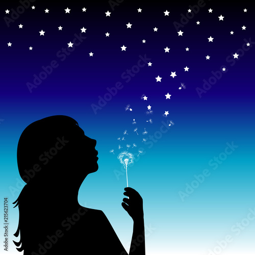Girl blowing into a dandelion and creating the stars