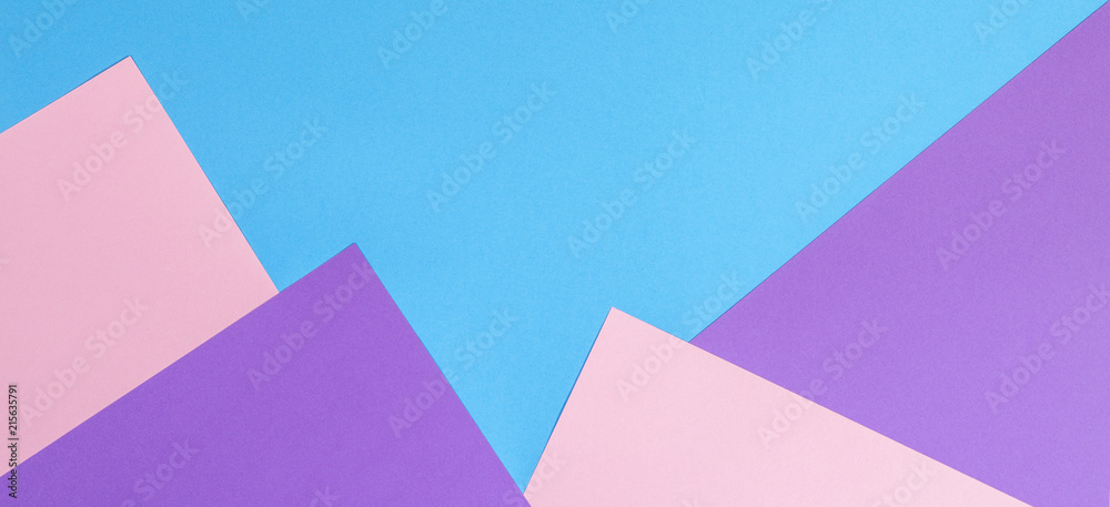 Color papers geometry flat composition background with pink violet and blue tones Color papers geometry flat composition background with pink violet and blue tones