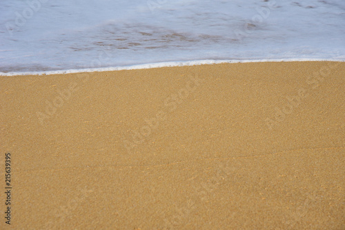 White Sea wave and sandy beach Background.Copy space