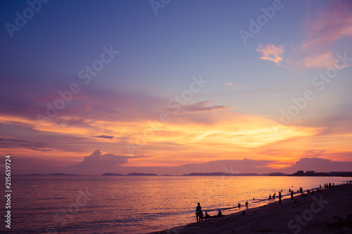  Sunset beach and twilight sky with silhouette relaxing tourist people photo