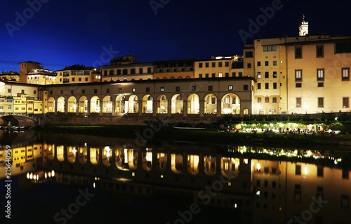 night landscape of Florence or Firenze city and the Arno river Italy
