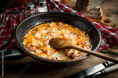 Photos Scrambled eggs with sausage.