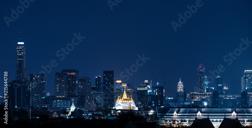 The golden mount  Wat Saket in Bangkok city  surround by modern buildings