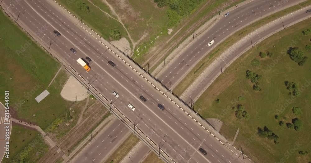 Top down aerial view of crossroad with car traffic in provincial town. 4K Top down aerial view of crossroad with car traffic in provincial town. 4K