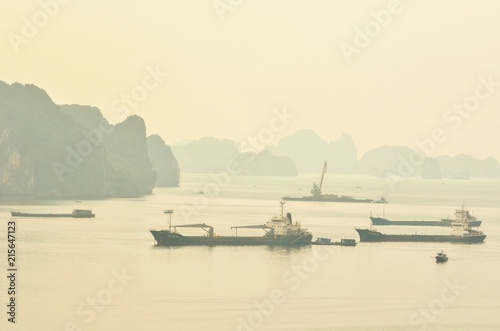 View of Cargo Ships at Halong Bay During Sunrise in the Morning