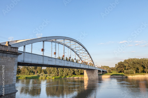 Belvarosi Hid bridge, also known as Downtown bridge on the tisza river during a sunny afternoon. The bridge connects the two parts of this city, the main one of Southern Hungary © Jerome