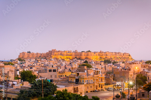 After sunset view of Jaisalmer Fort; former medieval trading center and princely state in western Indian state of Rajasthan; in the heart of Thar Desert; Jaisalmer the Golden City; Rajasthan; India