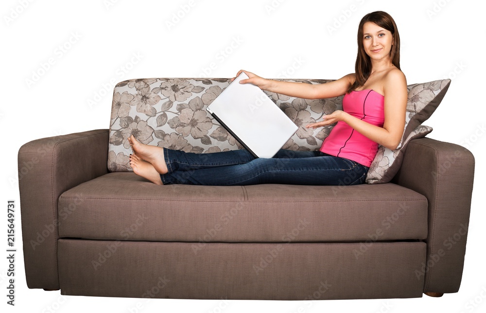 Portrait of a Young Woman Showing her Laptop While Sitting on a
