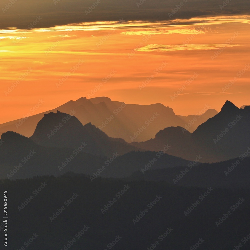 Golden sunrise in the Swiss Alps. View from Mount Rigi.