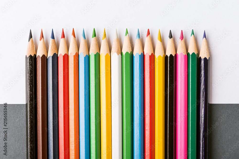 colored pencils on a gray background colored pencils on a gray background