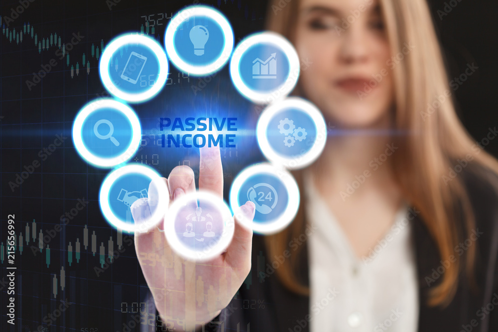 The concept of business, technology, the Internet and the network. A young entrepreneur working on a virtual screen of the future and sees the inscription: Passive income The concept of business, technology, the Internet and the network. A young entrepreneur working on a virtual screen of the future and sees the inscription: Passive income
