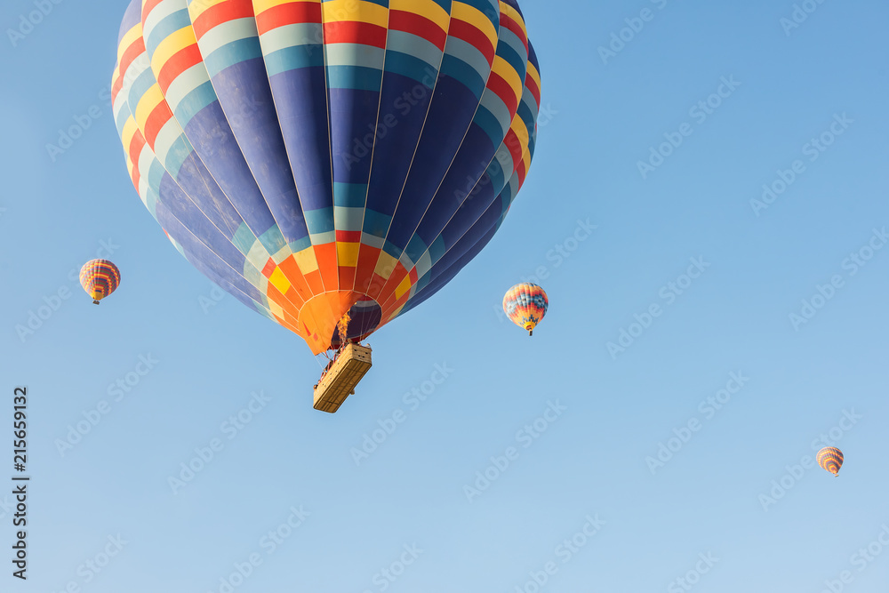 Naklejka premium Bright colorful balloons against the blue sky. 