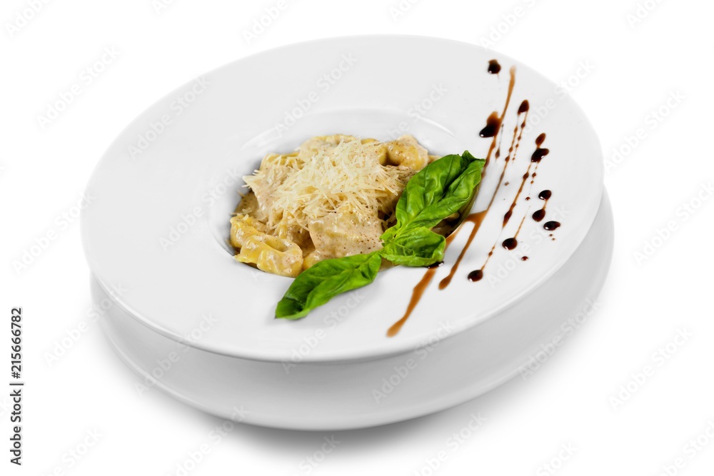 Delicious meat with green basilic in white plate Delicious meat with green basilic in white plate