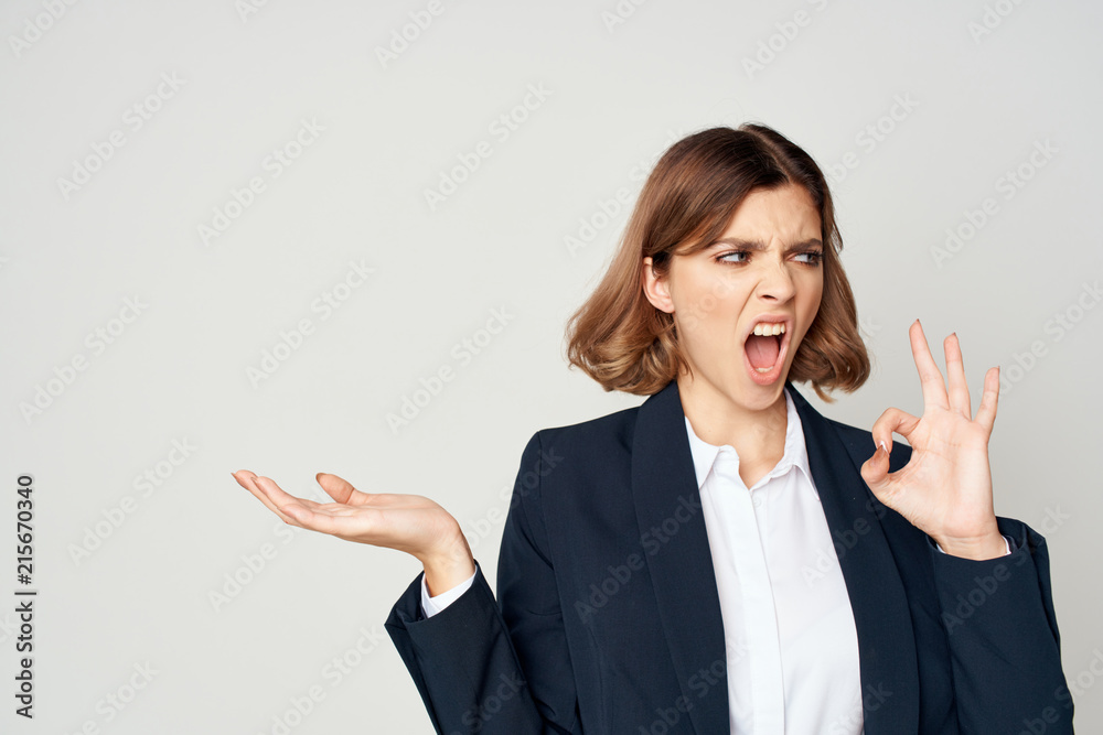 business woman with emotions on the face on a hand free place business woman with emotions on the face on a hand free place