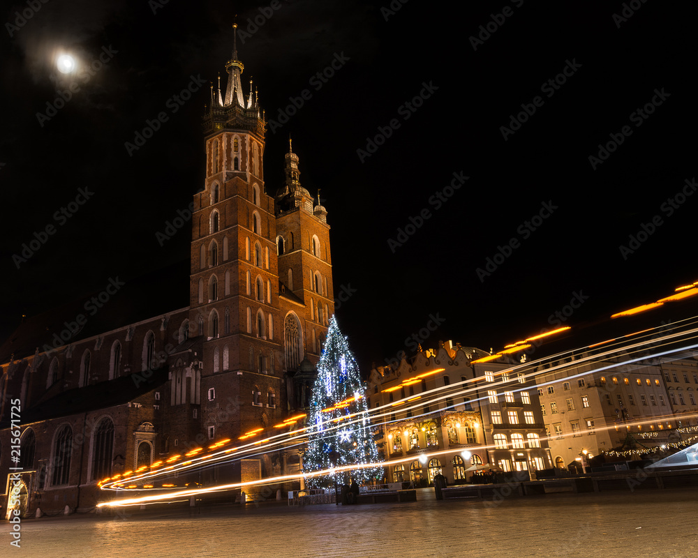 Long exposure Saint Mary's Church of Krakow. Beautiful Brick Gothic church located in the Main Market Square in Kraków, Poland. Long exposure Saint Mary's Church of Krakow. Beautiful Brick Gothic church located in the Main Market Square in Kraków, Poland.