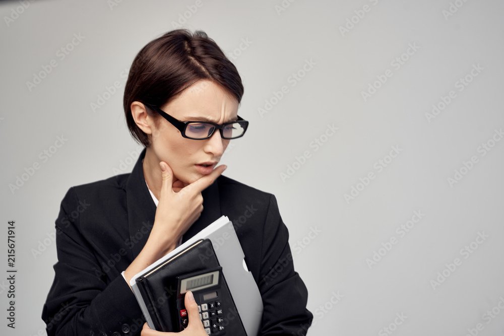 business woman with glasses thinking