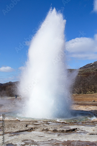 Strokkur geysir eruption at the Geysir geothermal Park in Iceland © van_sinsy