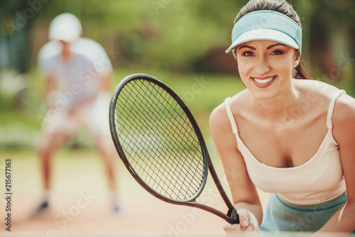 Portrait of Beautiful Young Girl on Tennis Court. © VadimGuzhva