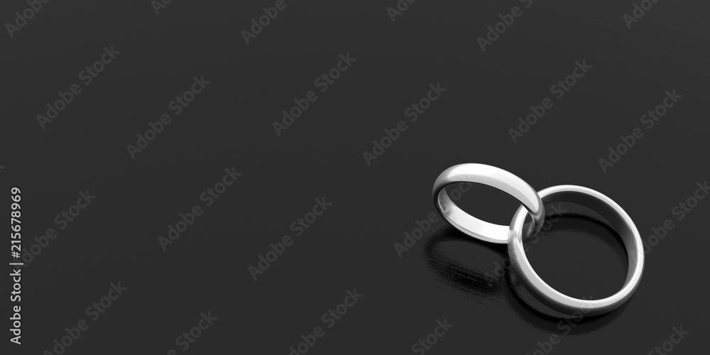 Two silver joined wedding rings isolated on black background, banner, copy space, 3d illustration Two silver joined wedding rings isolated on black background, banner, copy space, 3d illustration