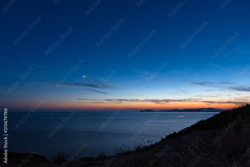 starry sky over Alghero coastline