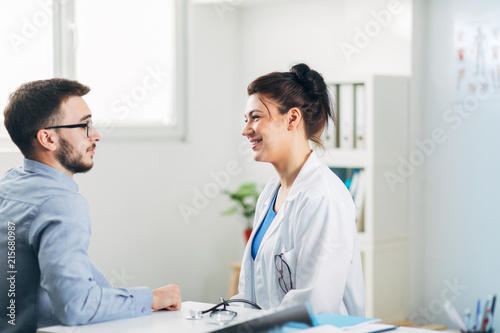 Doctor Examining Patient in Office