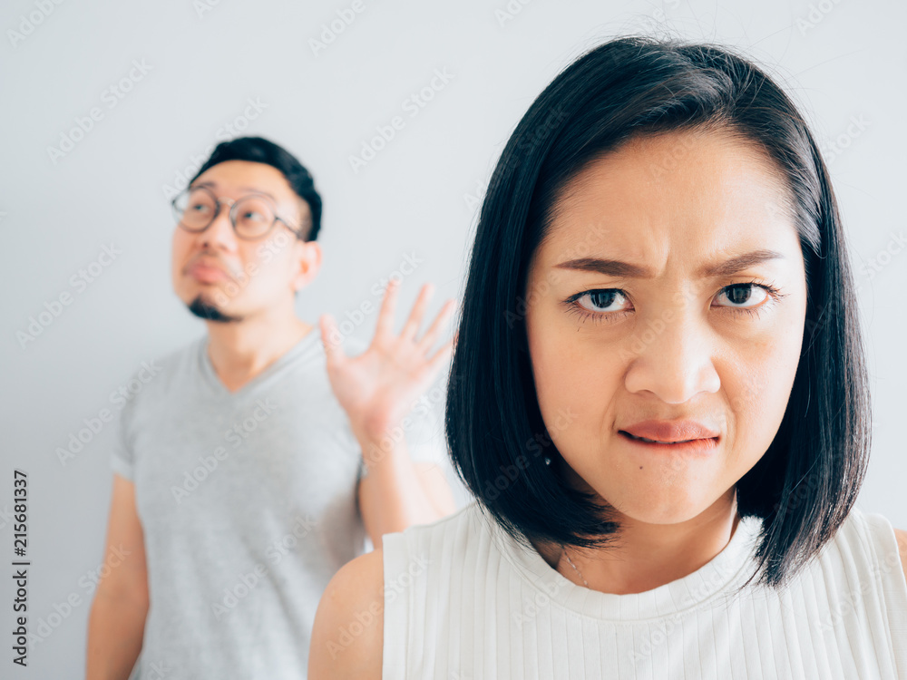 Annoyed wife and funny tricky husband. Annoyed wife and funny tricky husband.