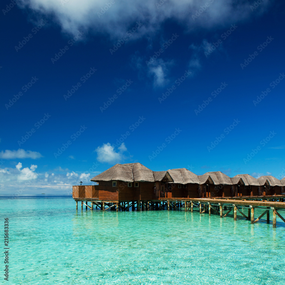 Peaceful and relaxing on the sea. Happy island lifestyle. Crystal-blue sea of tropical beach. Vacation at Paradise. Ocean beach relax, travel to Maldives islands